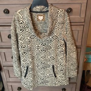 Anthropologie tunic top in black pattern in GUC size M. There are a few pulls.